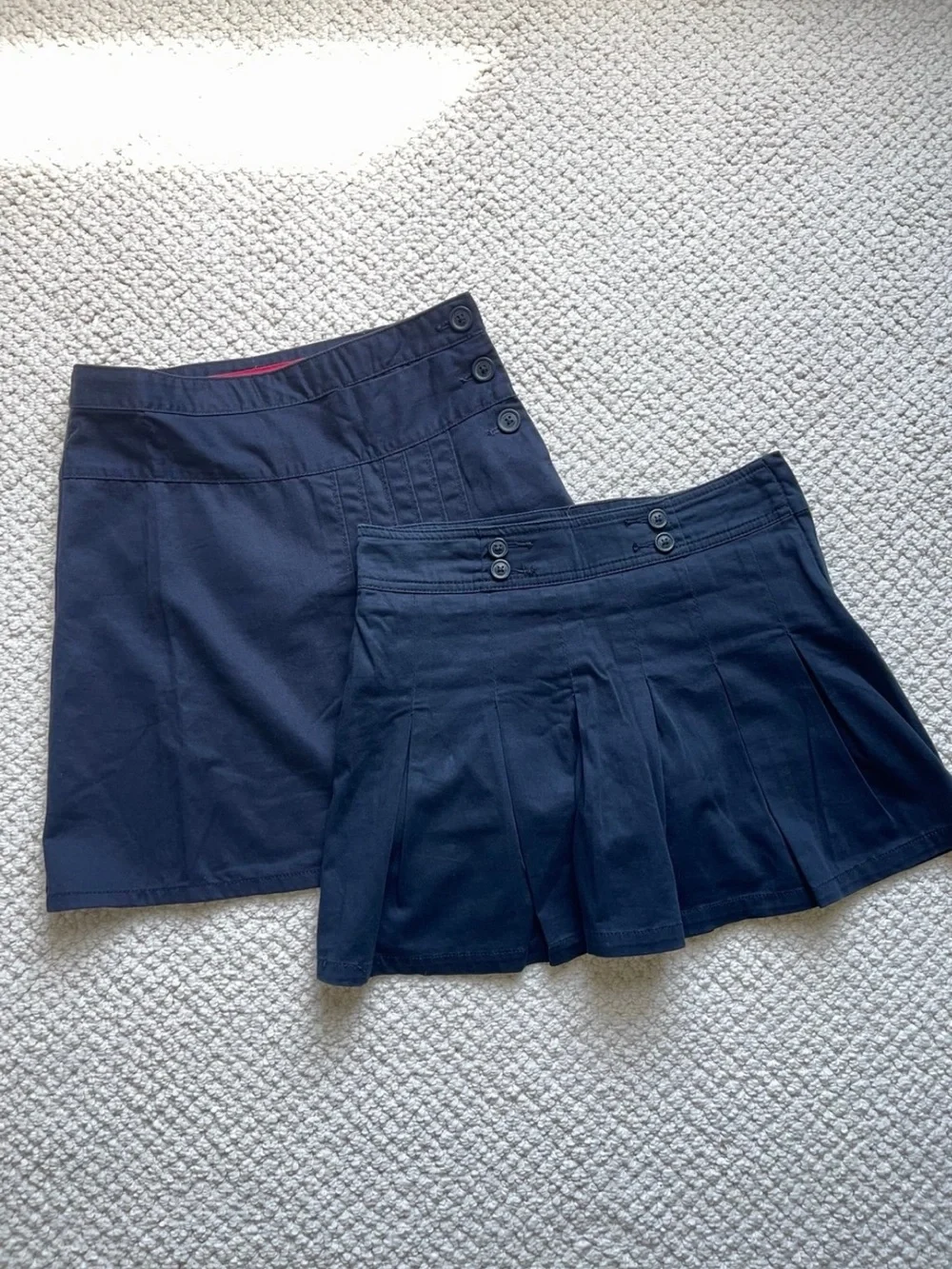 Two  skirts uniforms size 10